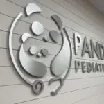 A panda pediatric hospital sign on the wall.