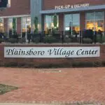 A sign that says plainsboro village center