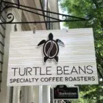 A sign for turtle beans specialty coffee roasters.